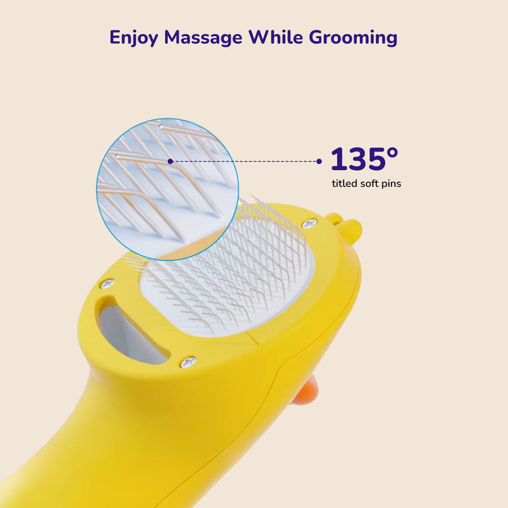 Close-up of yellow pet brush pins angled for comfortable grooming.