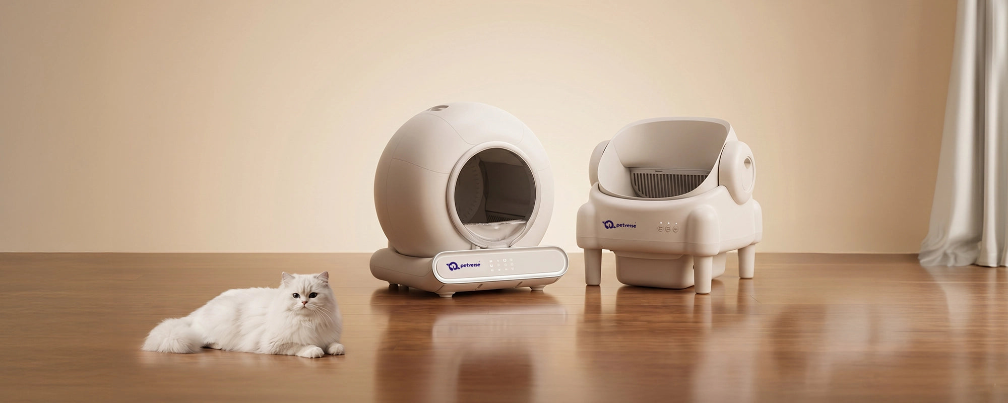 Two white cat litter boxes on a wooden floor with a beige wall in the background.