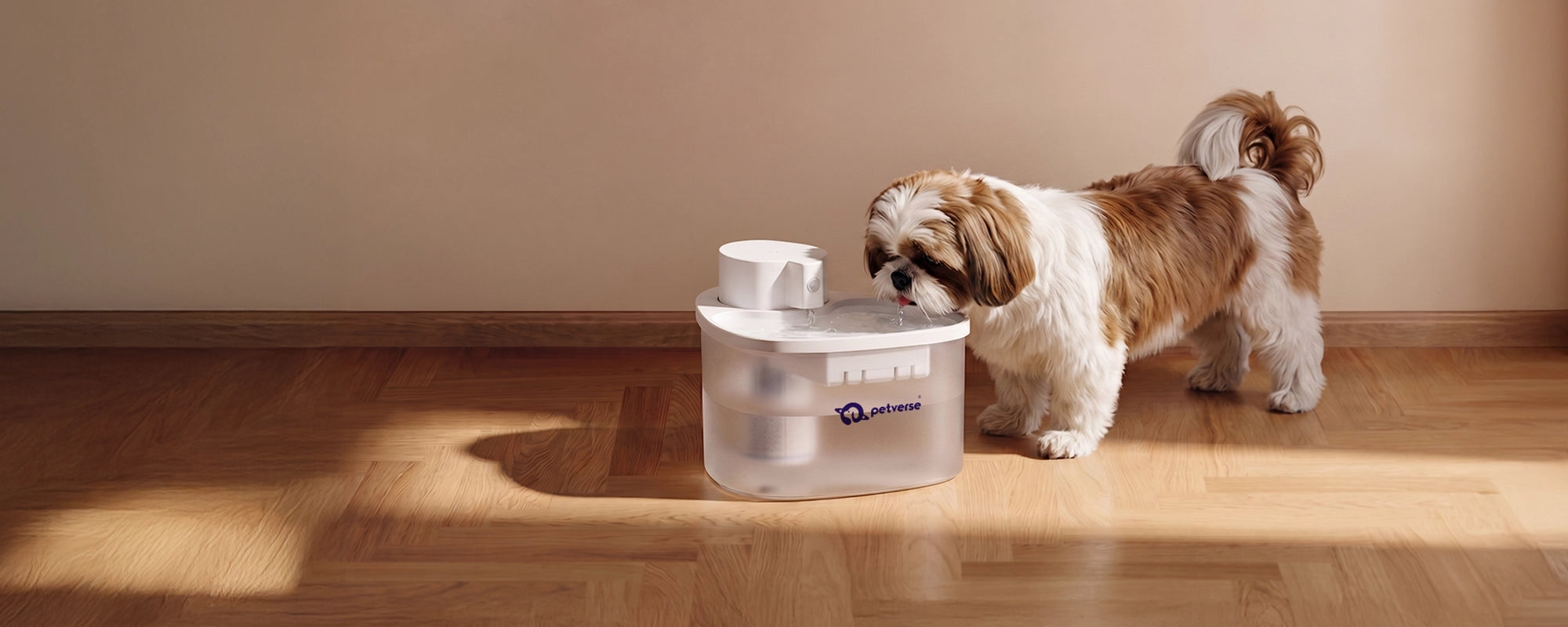 Dog drinking from a white pet water fountain