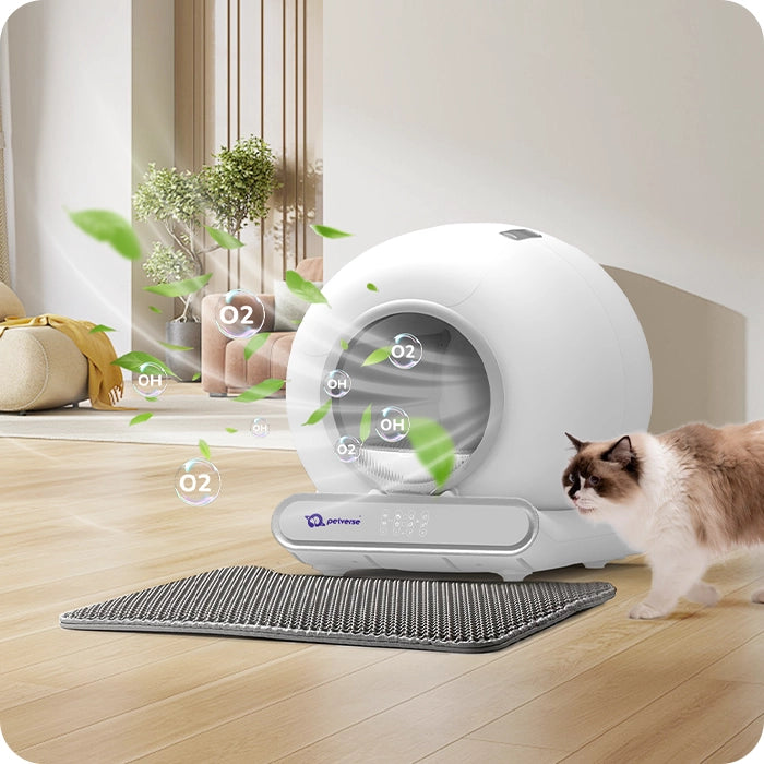 Automatic cat litter box with cat and air purification icons.