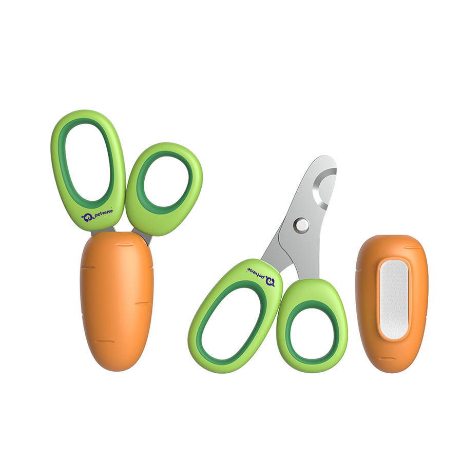 Green‑handled pet nail clippers with carrot‑shaped orange protective cover