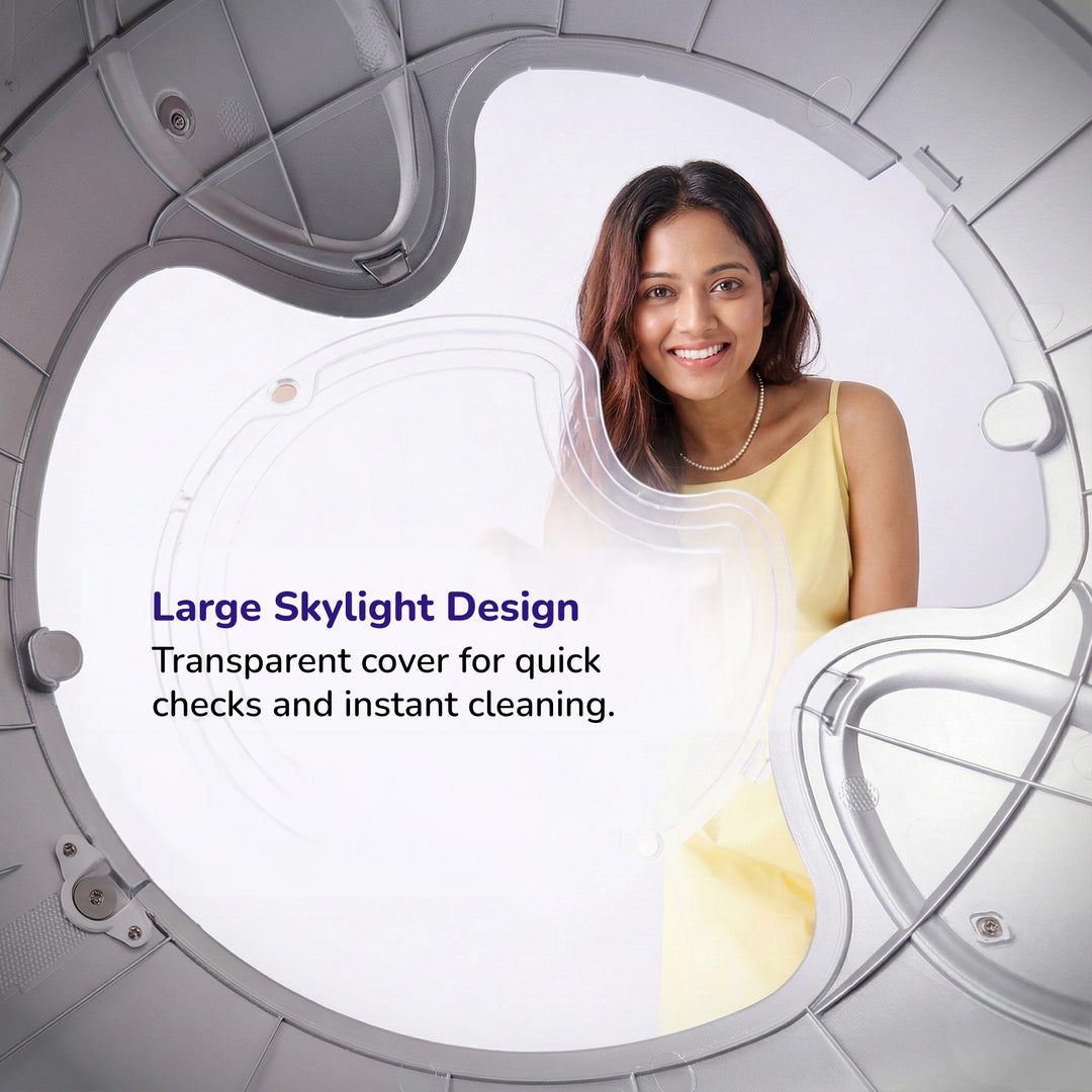 Woman smiling through large transparent skylight on top of silver smart cat litter box.