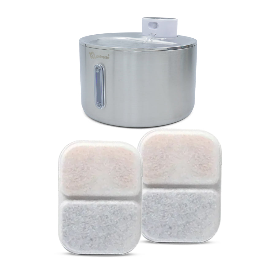 Pet water fountain with two replacement filters.